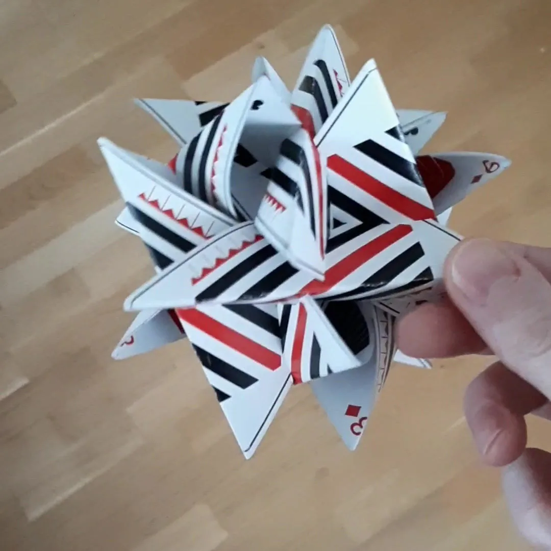 Pinstripe cards folded into a star shape
