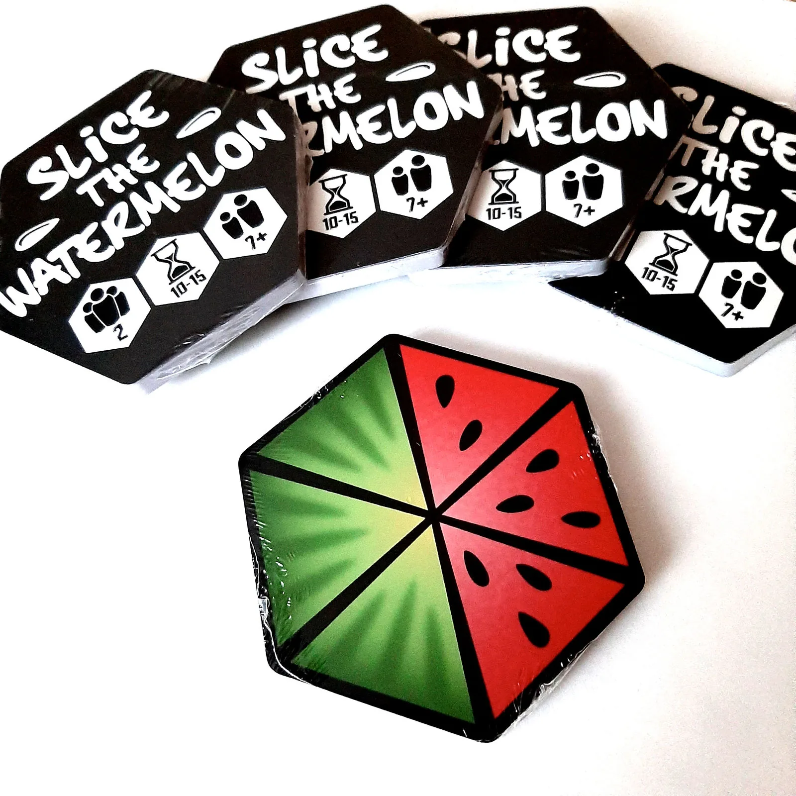 Printed card packs with a watermelon tile in front